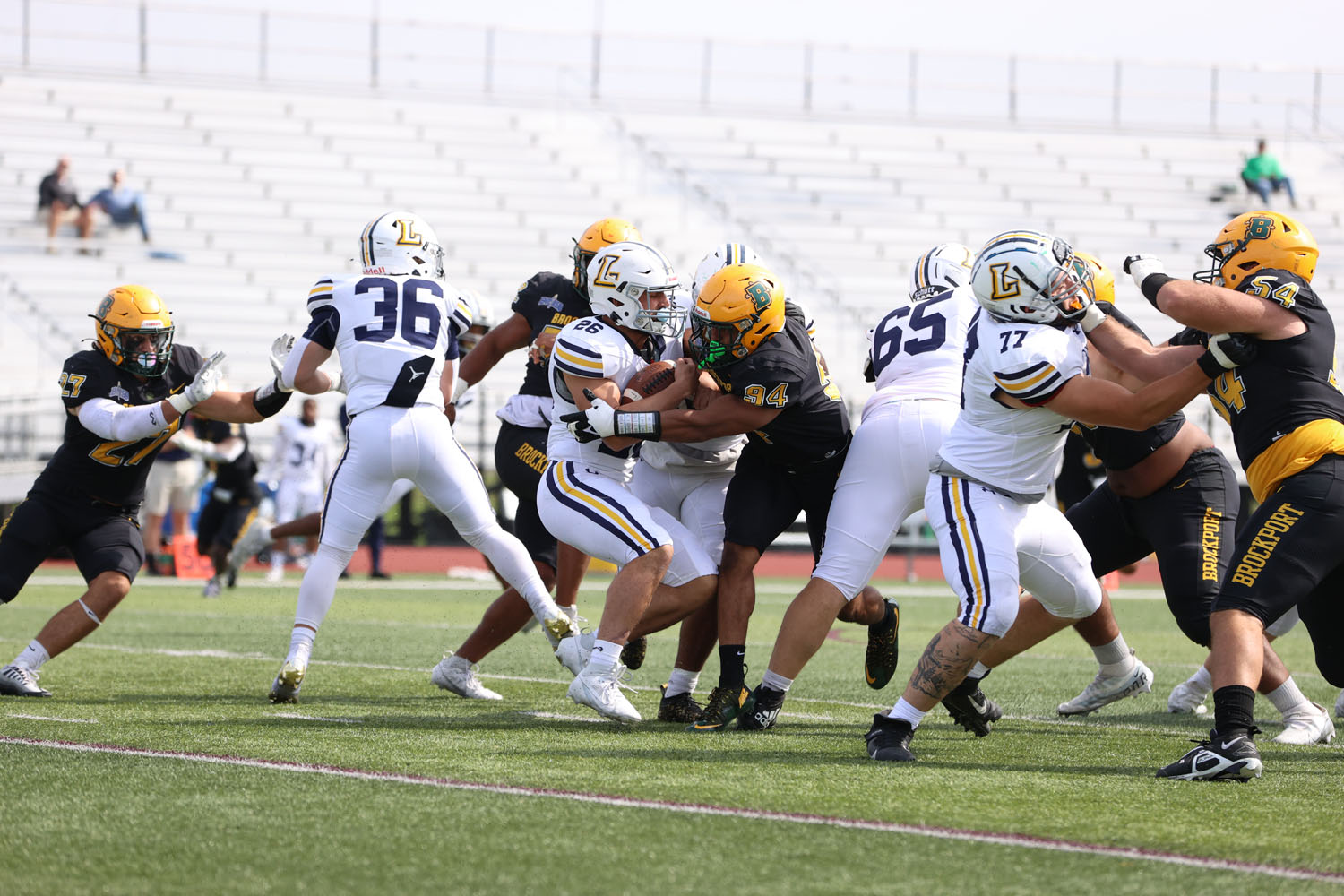 Brockport defense stuffing the run by Lycoming