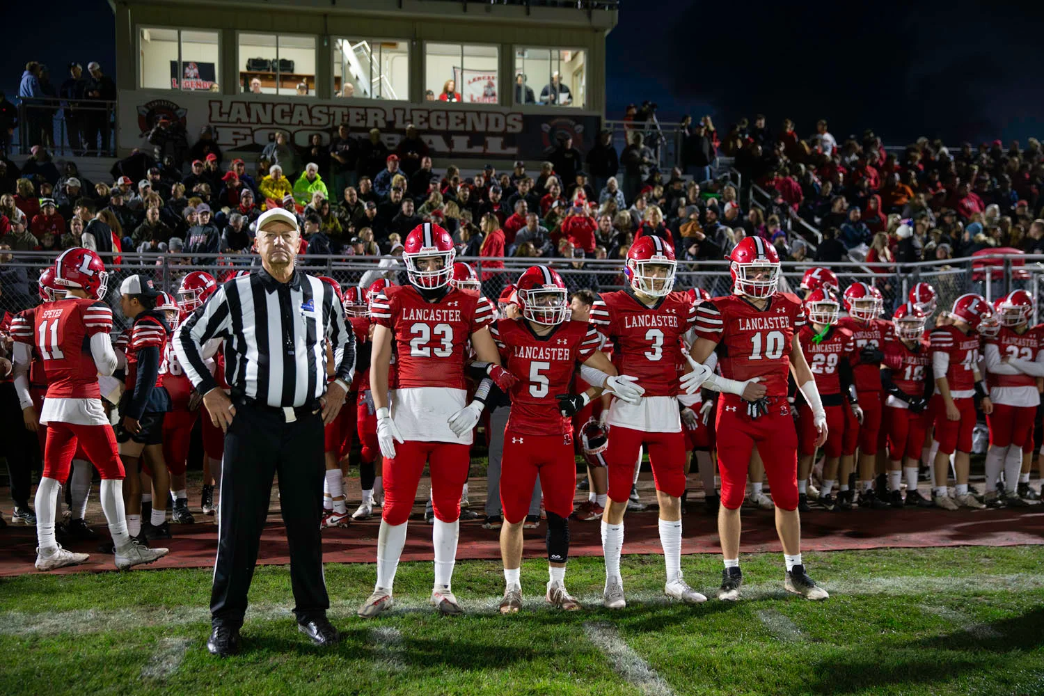 Captains about to go out and flip the coin