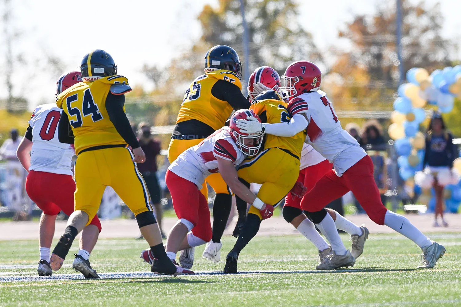 Lancaster tackling the ball carrier