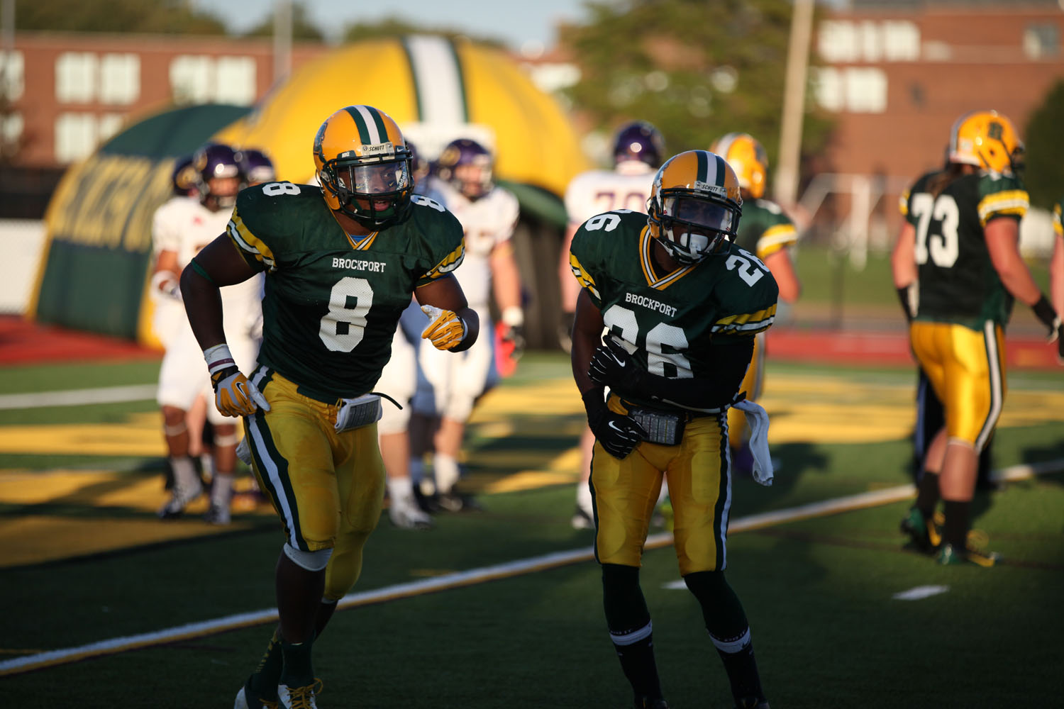 Brockport players celebrating a touchdown