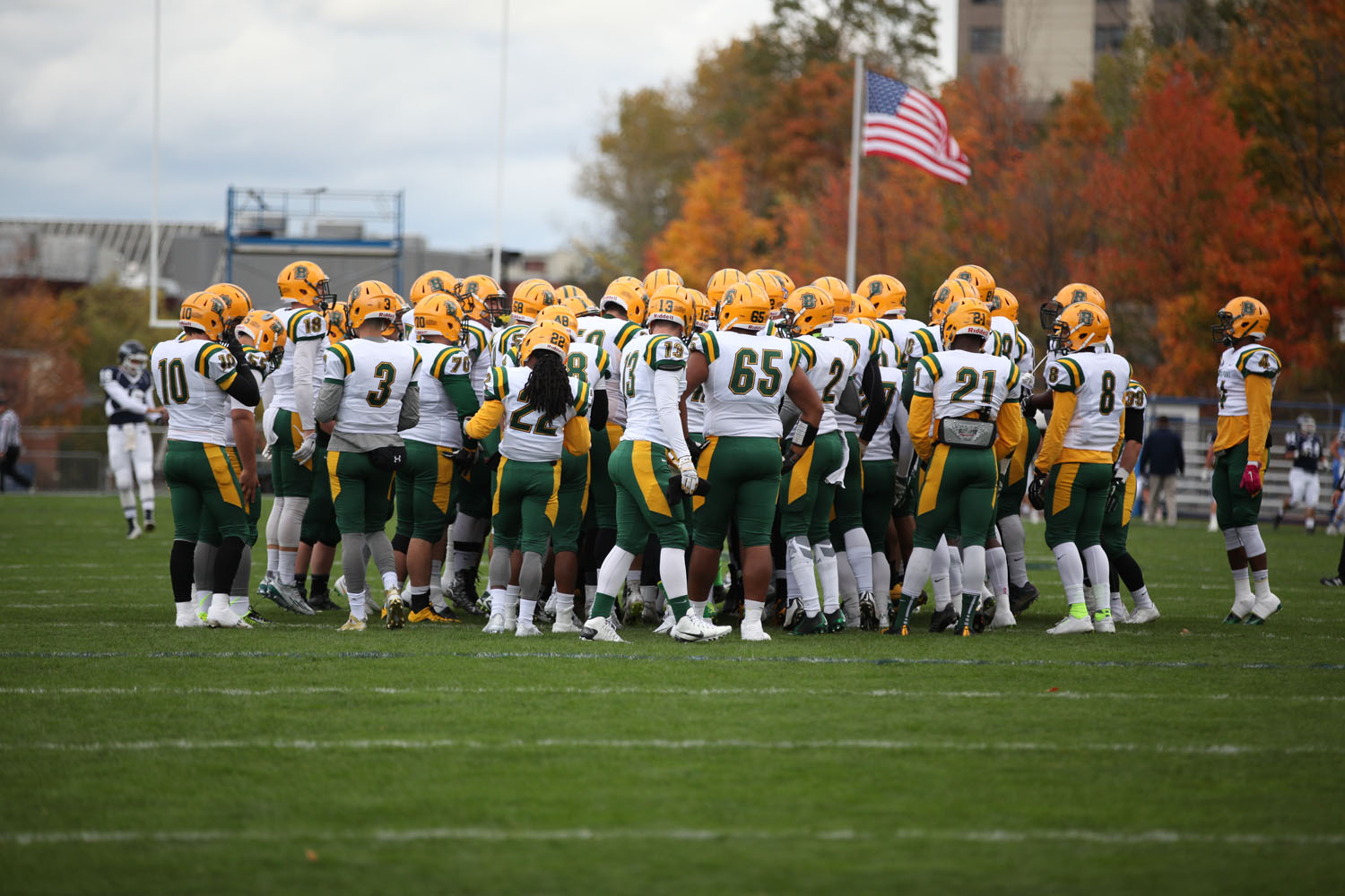 Brockport in a huddle before the game