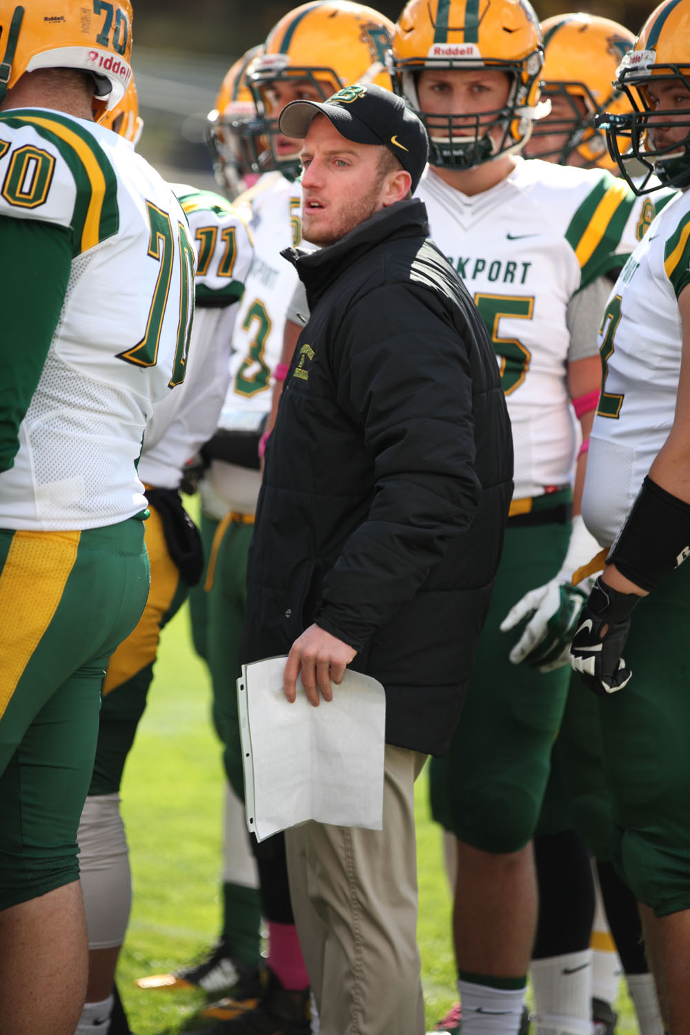 Coach Spalik in the huddle