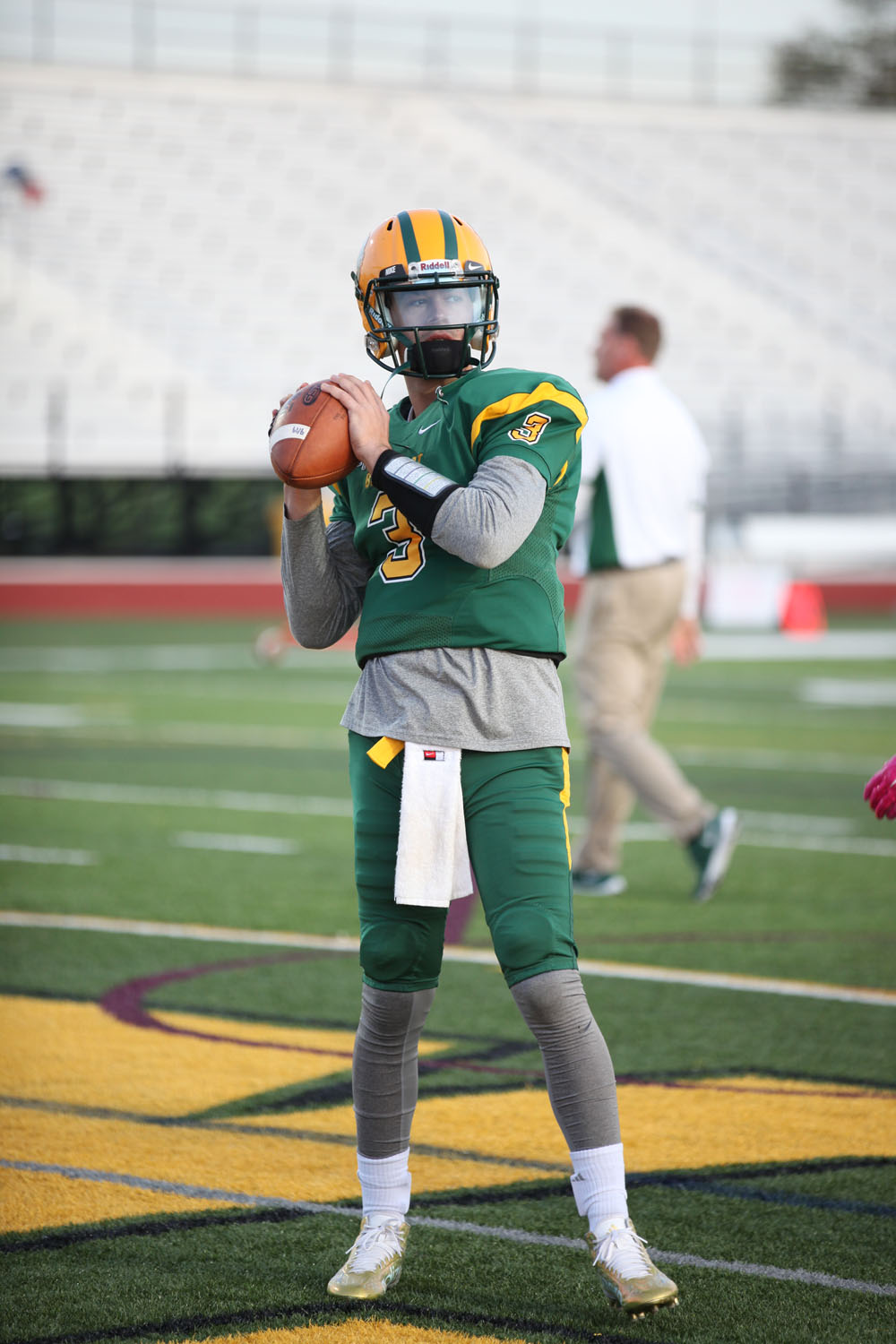 Chase Venuto throwing a pass in warmups