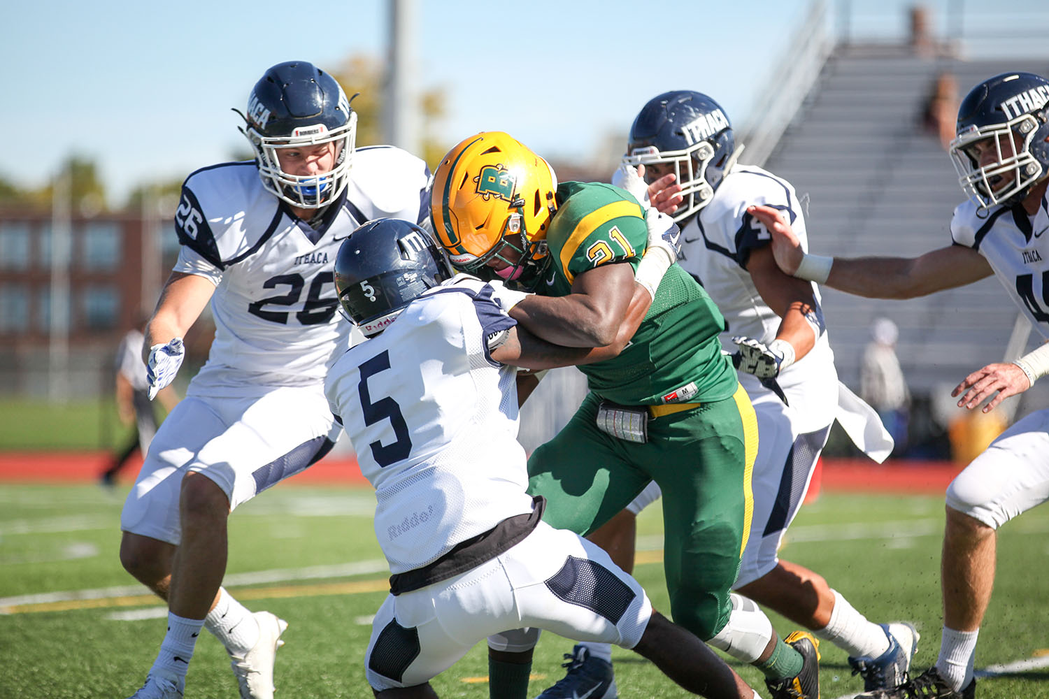 Dan Andrews running over a defender