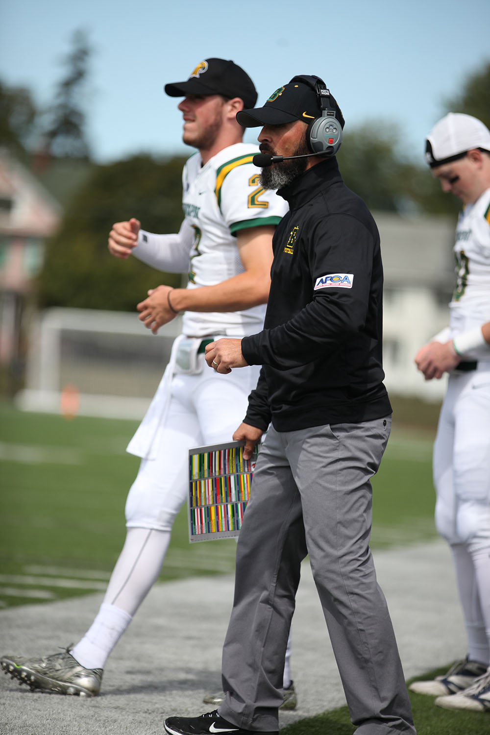 Coach Mangone calling plays for the offense