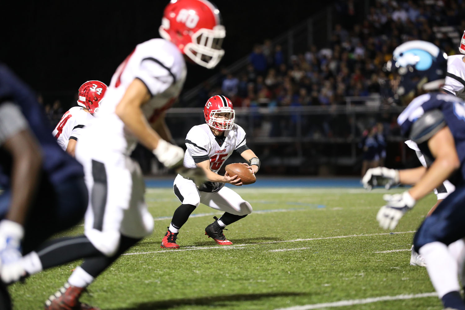 Ryan Mansell catching the snap and running the play