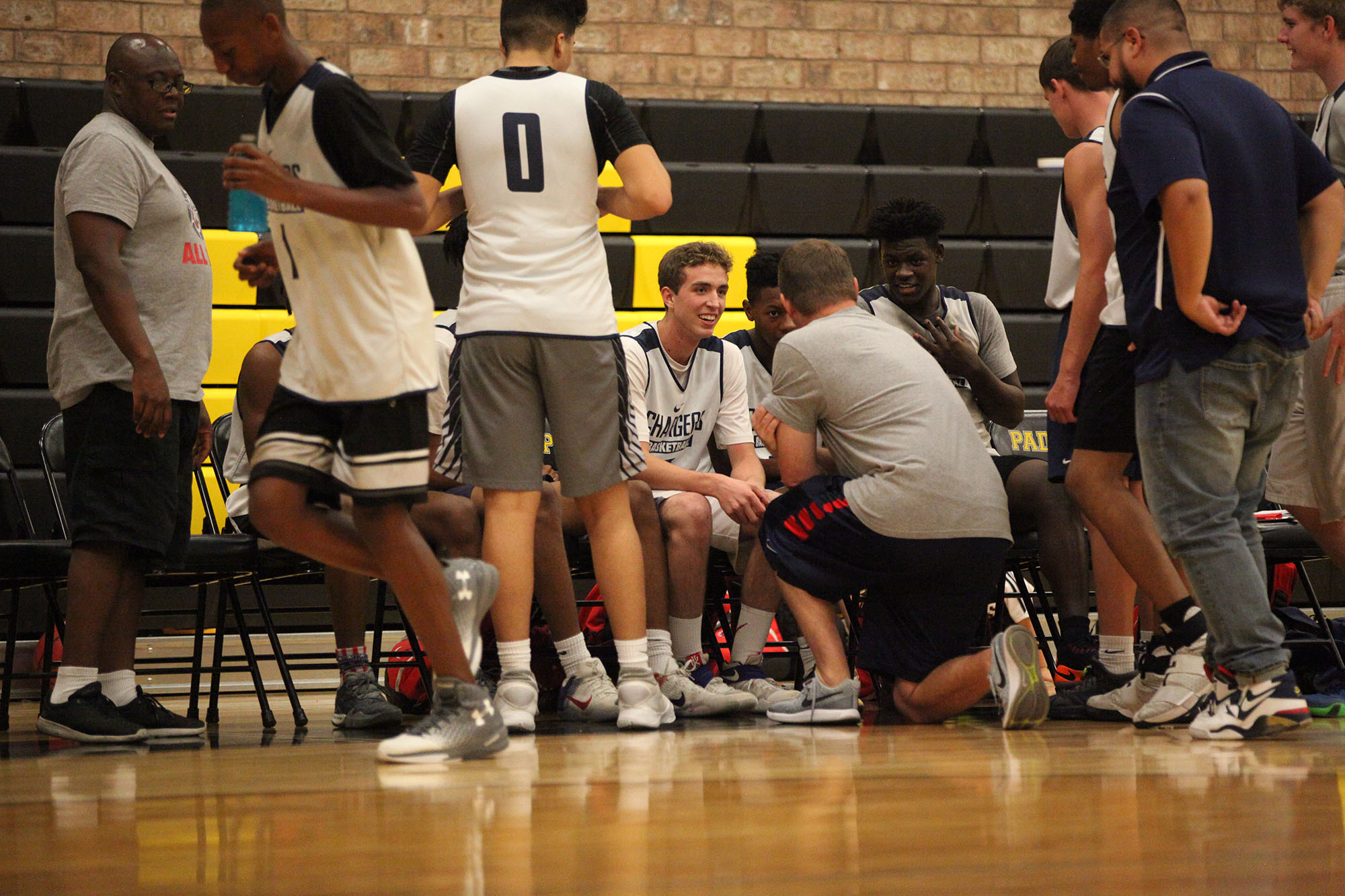 Coach Dentz talking to his team