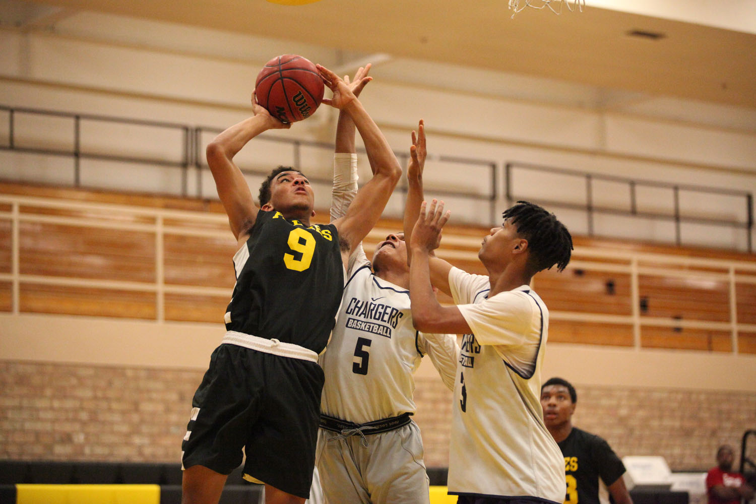 Marcos player going to the hoop