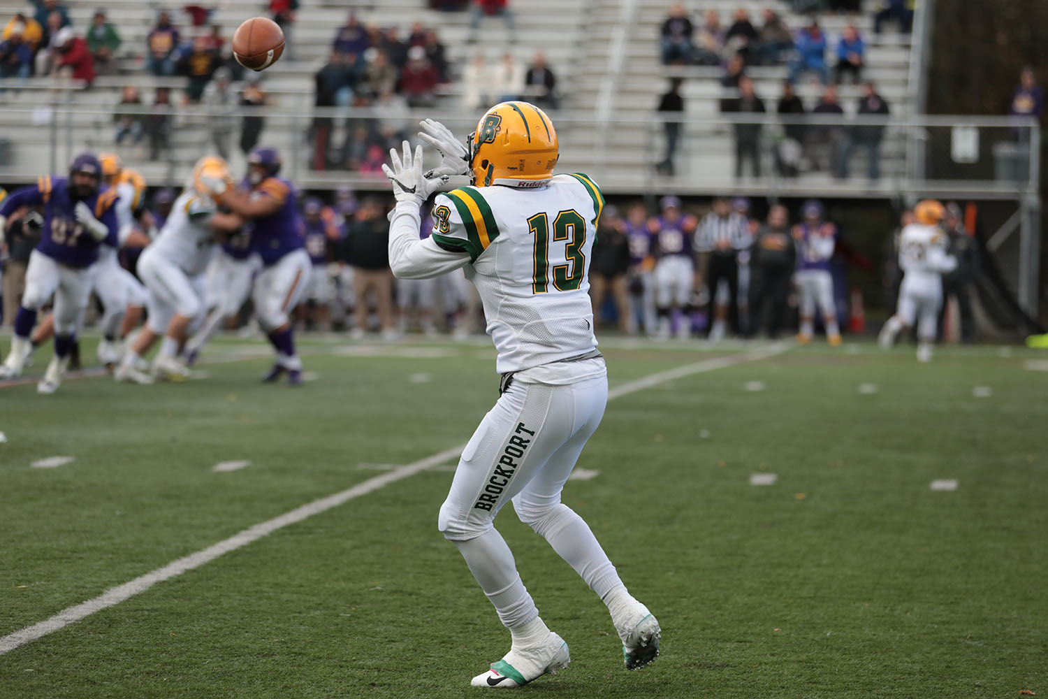 WR Alex Benson about to catch the ball and gain some more yards