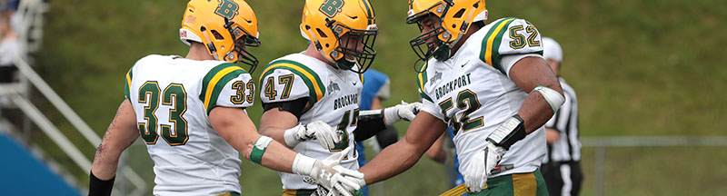 Brockport defensive players celebrating