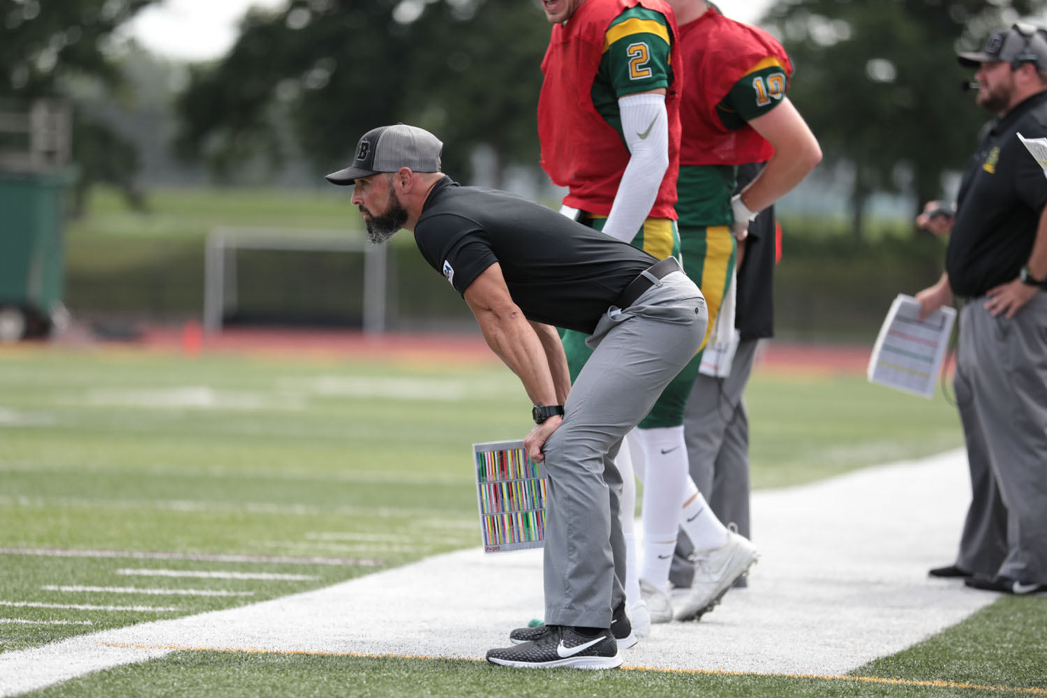 Coach Mangone watching his team play