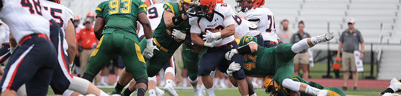 Brockport defensive making a tackle