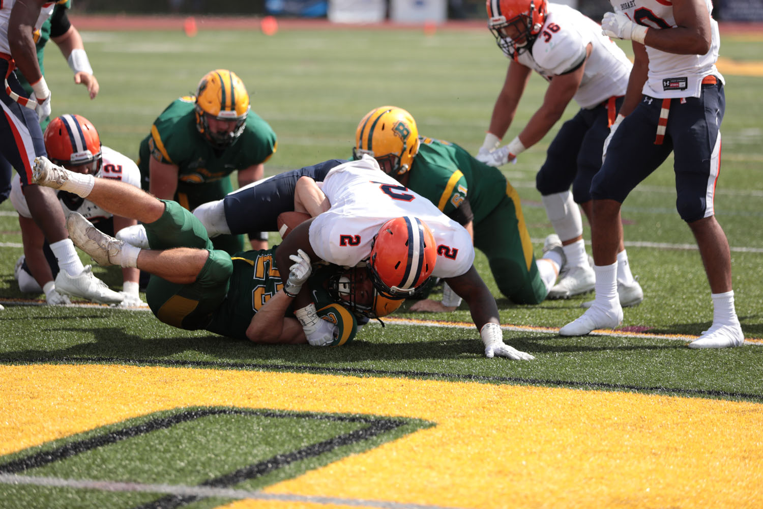 Zach Samborski on the ground with a defender on him after scoring a Touchdown!