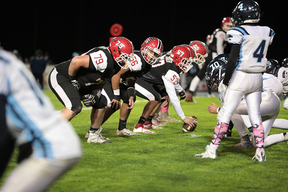 Lancaster OL Conor Mahony checking the line