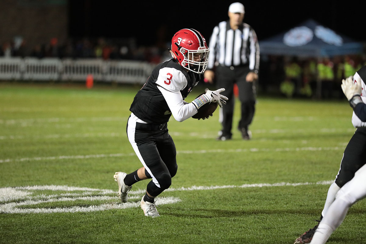 Lancaster WR catches the ball and looking for space