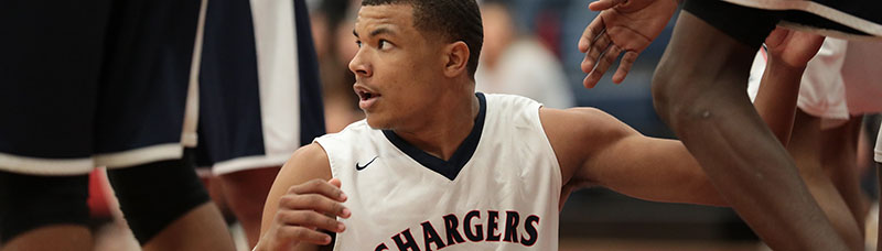 Lawrence Charles looking at the ref after a foul