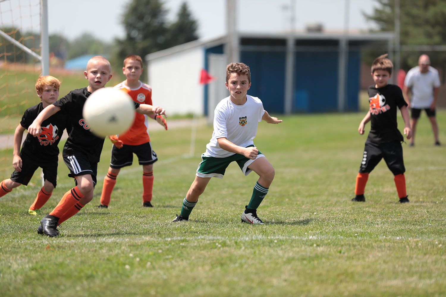 Brendan going after the ball when its kicked back in to play