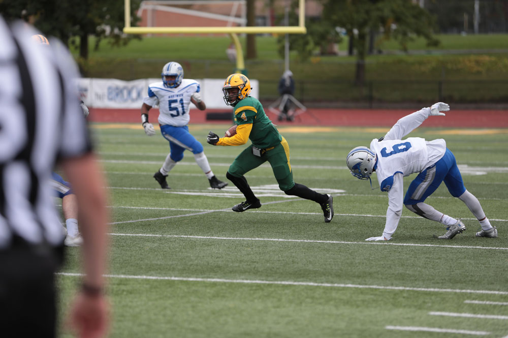 Alex Benson with a catch and looking for daylight