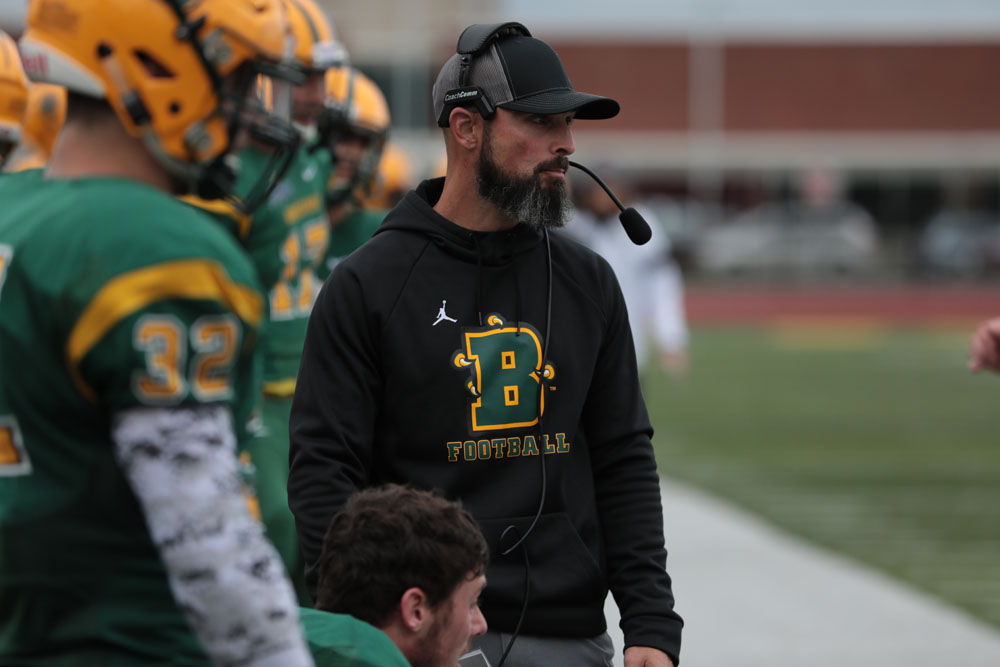 Coach Mangone watching his team from the sidelines