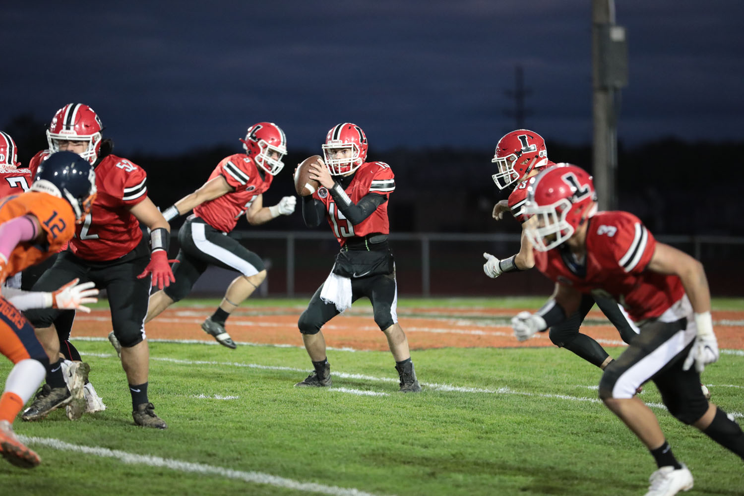 Jason Mansell running about the offense