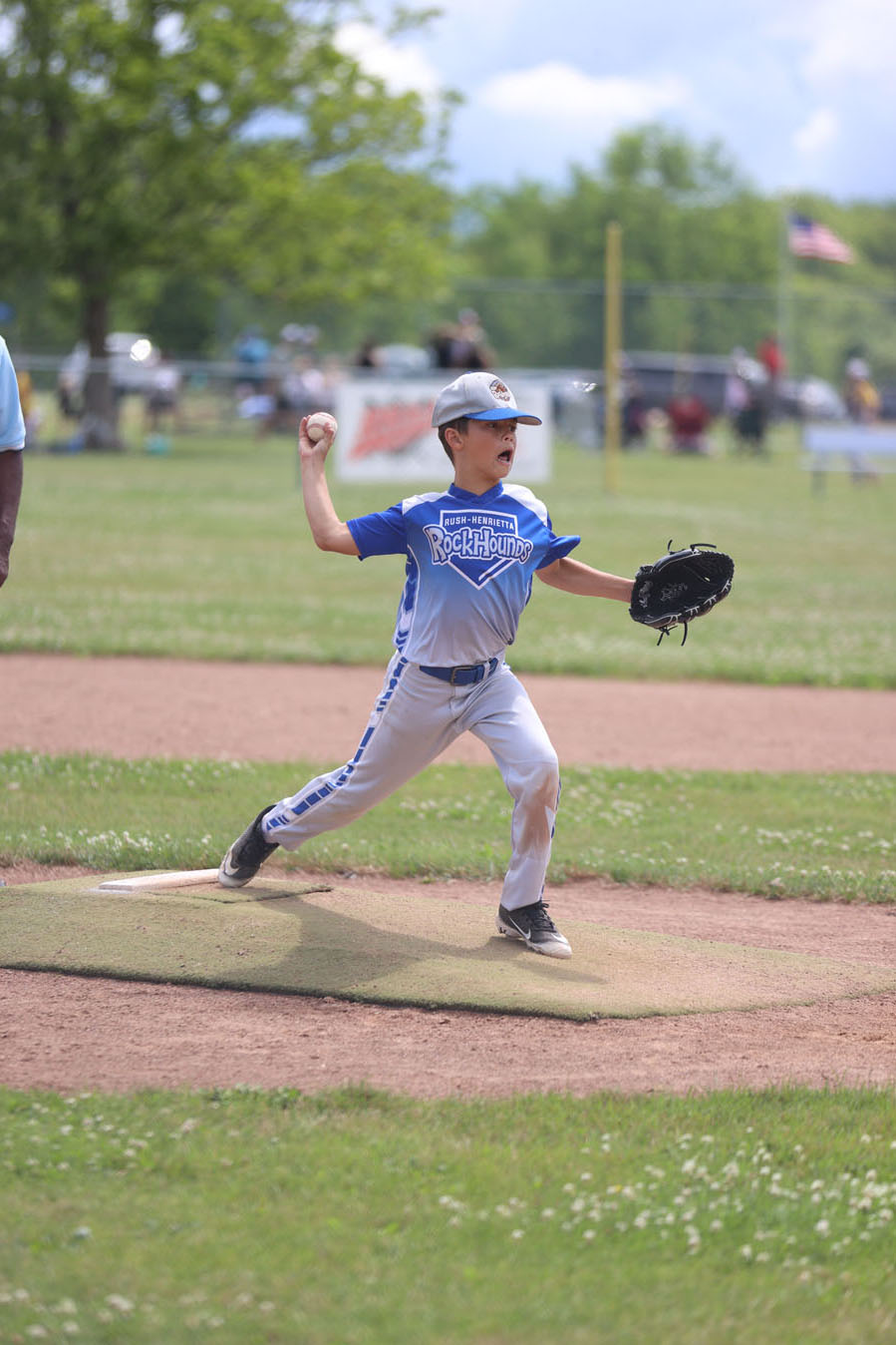 Evan throwing the ball as he pitches