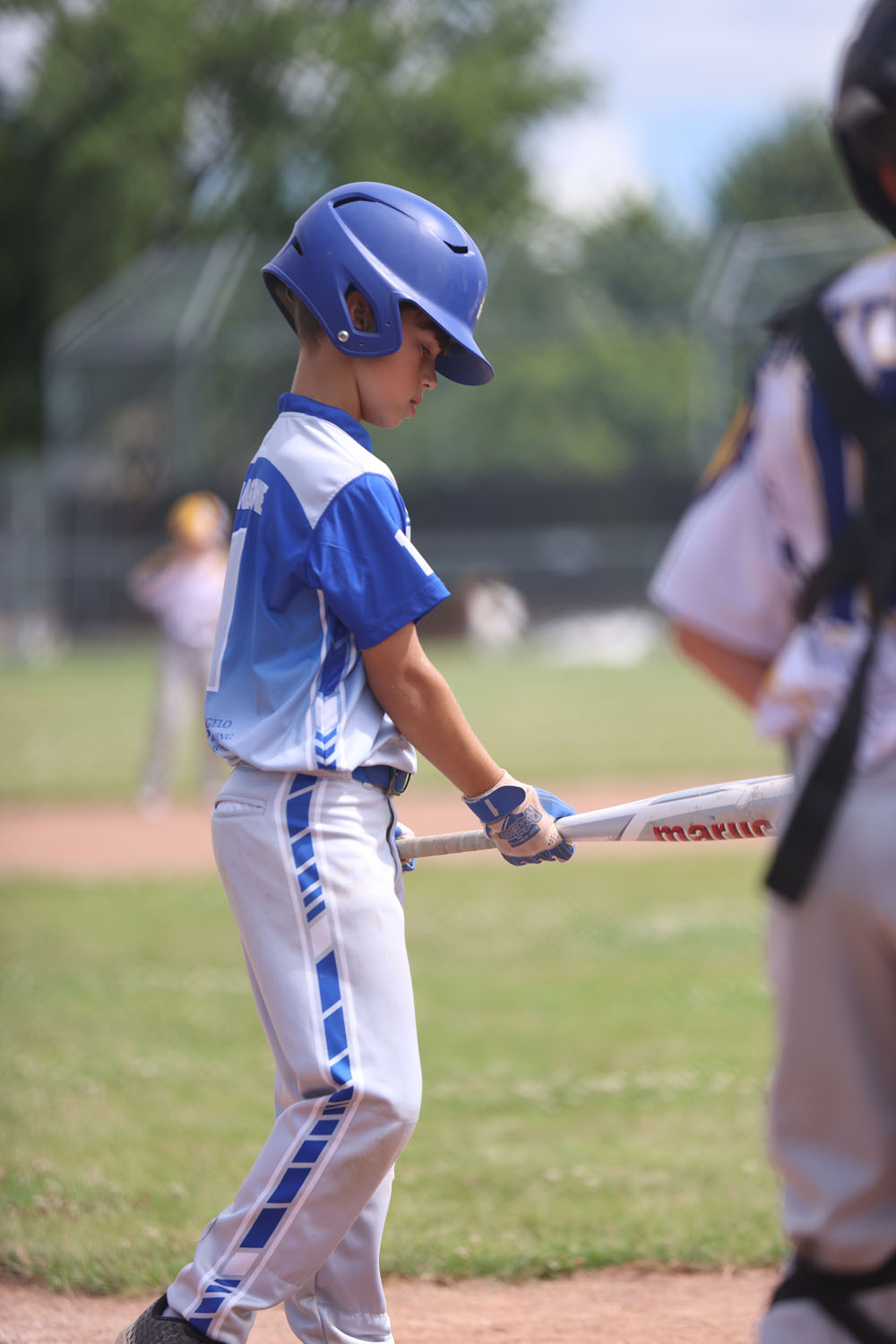 Evan walking up to bat