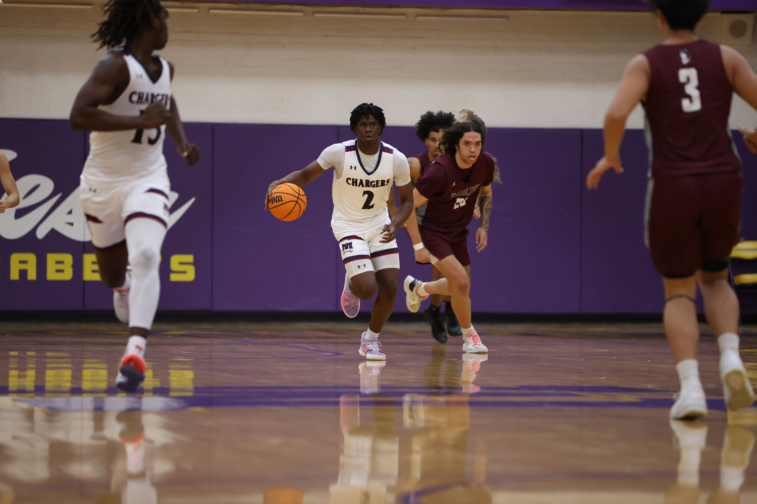 Erenzo pushing the ball up the court