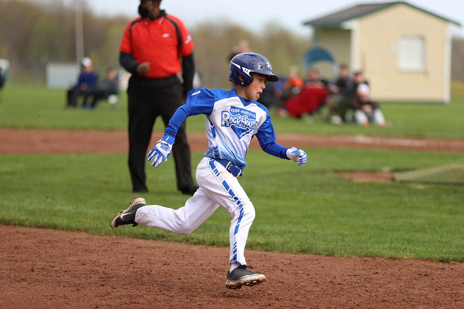 Evan about to round 3rd base