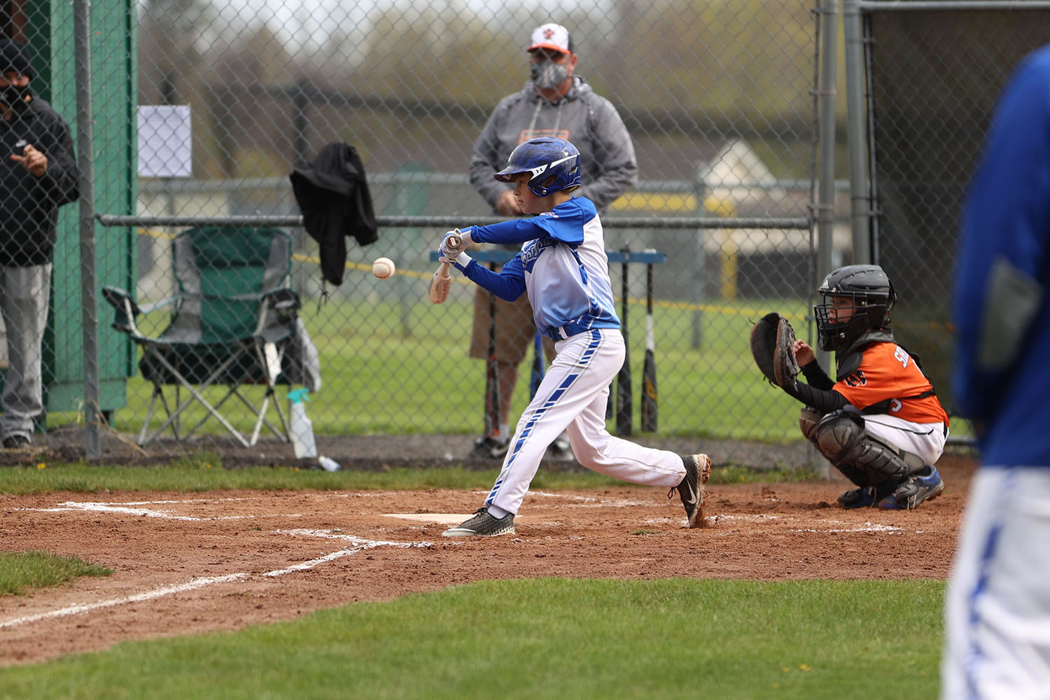 Evan hitting the ball to right field