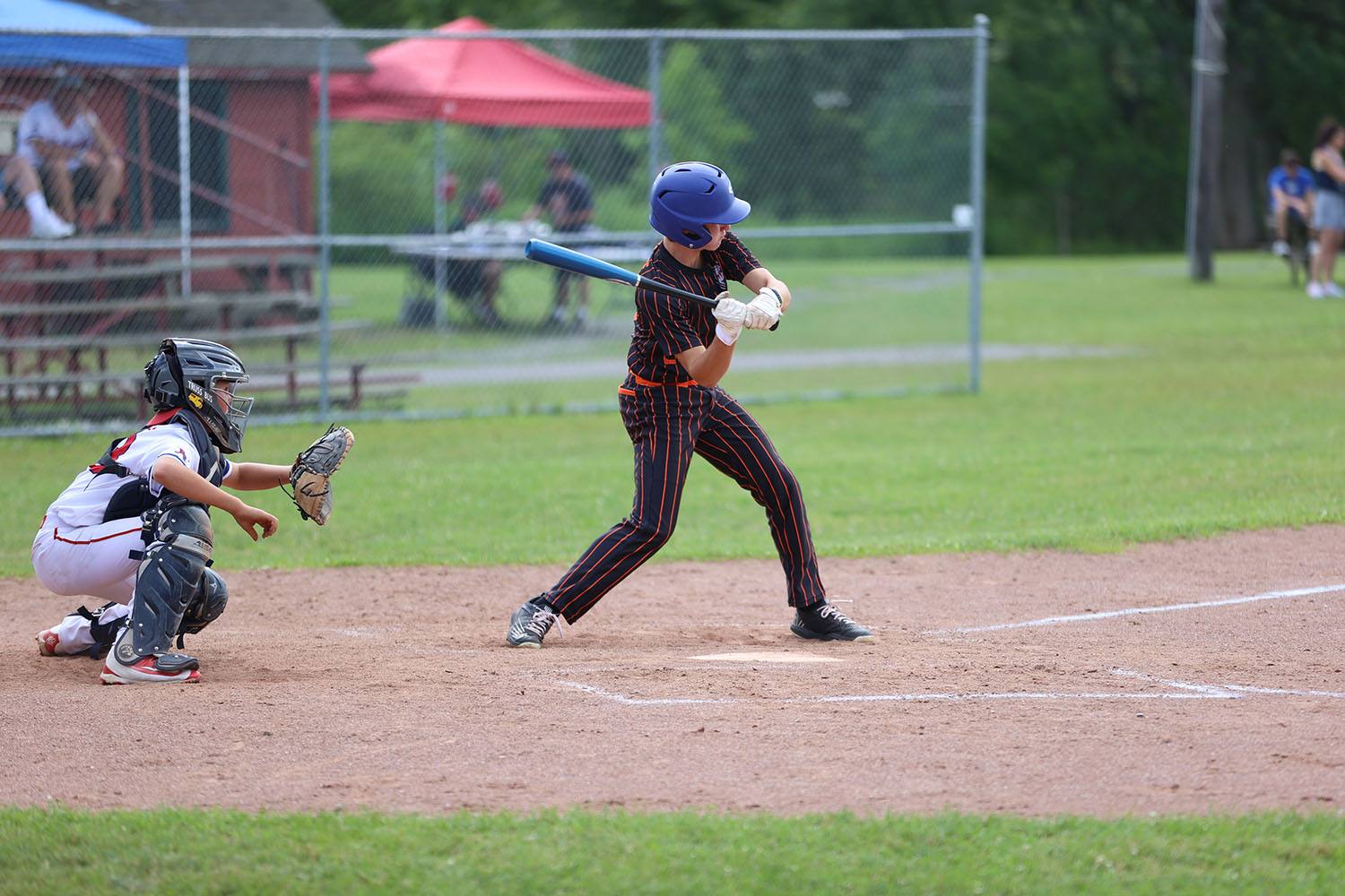 Brendan swinging the bat