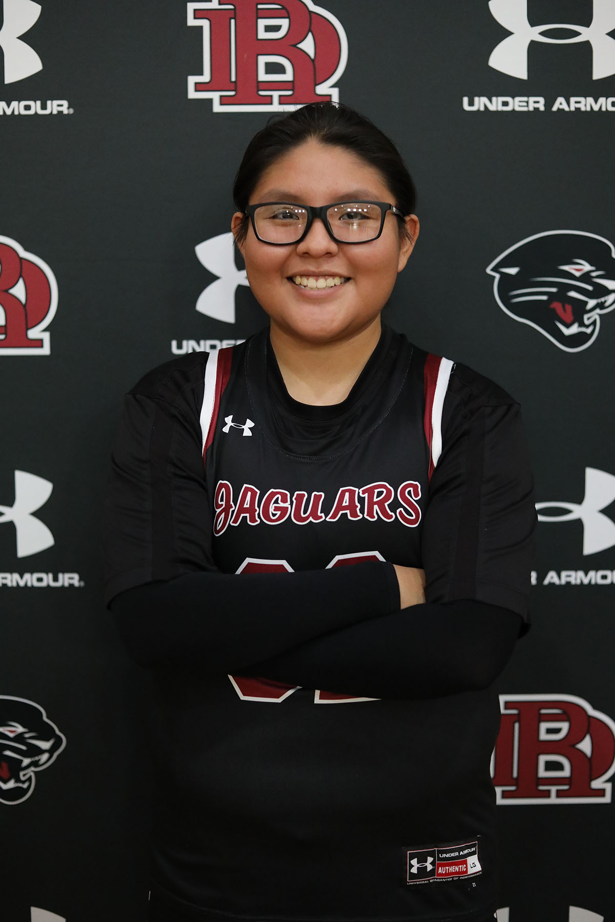 Girls Basketball player smiling for the camera