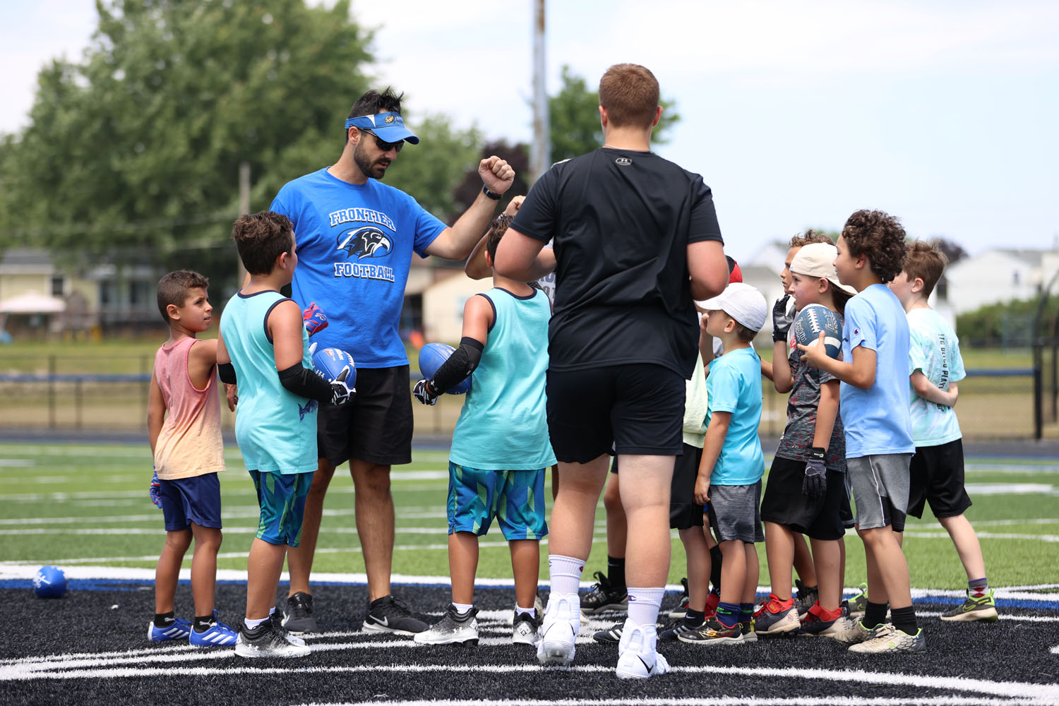 Campers about to break a huddle