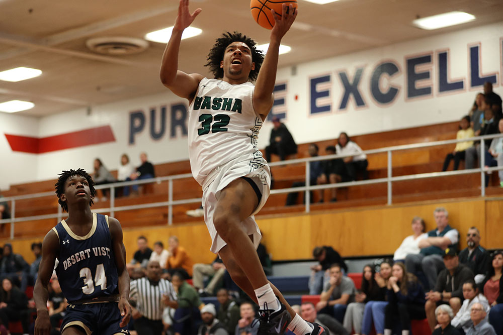 Basha guard going up for the layup