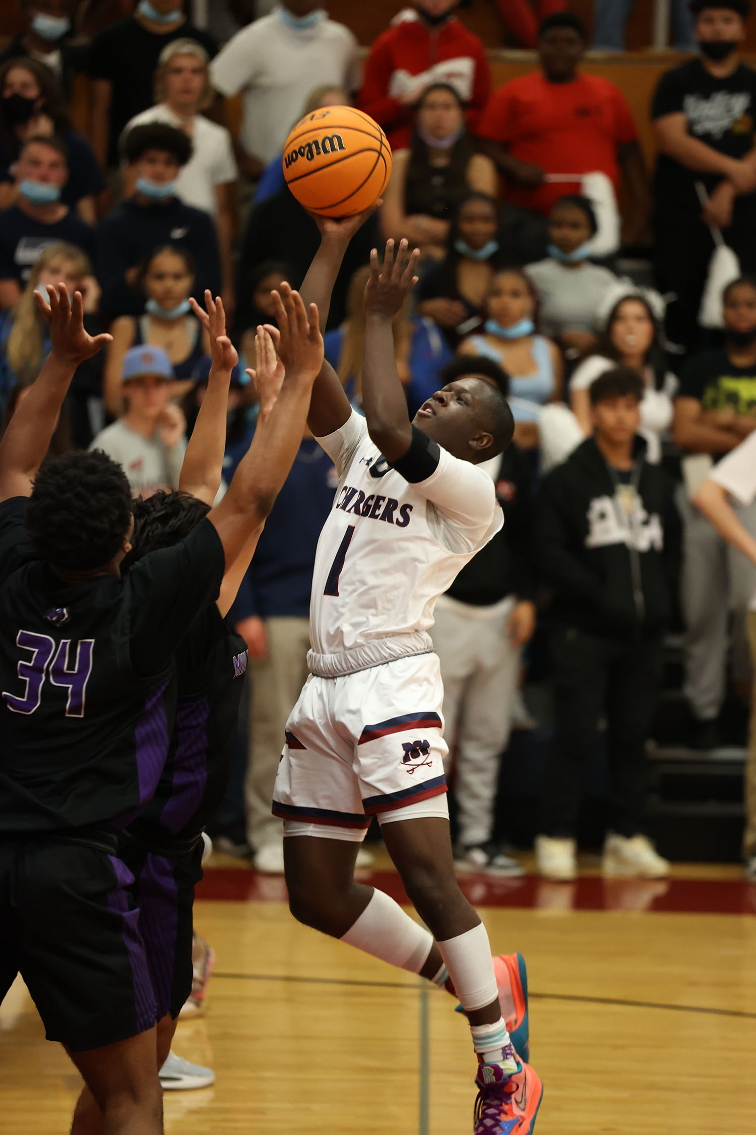 Davion Butler attempts a shot