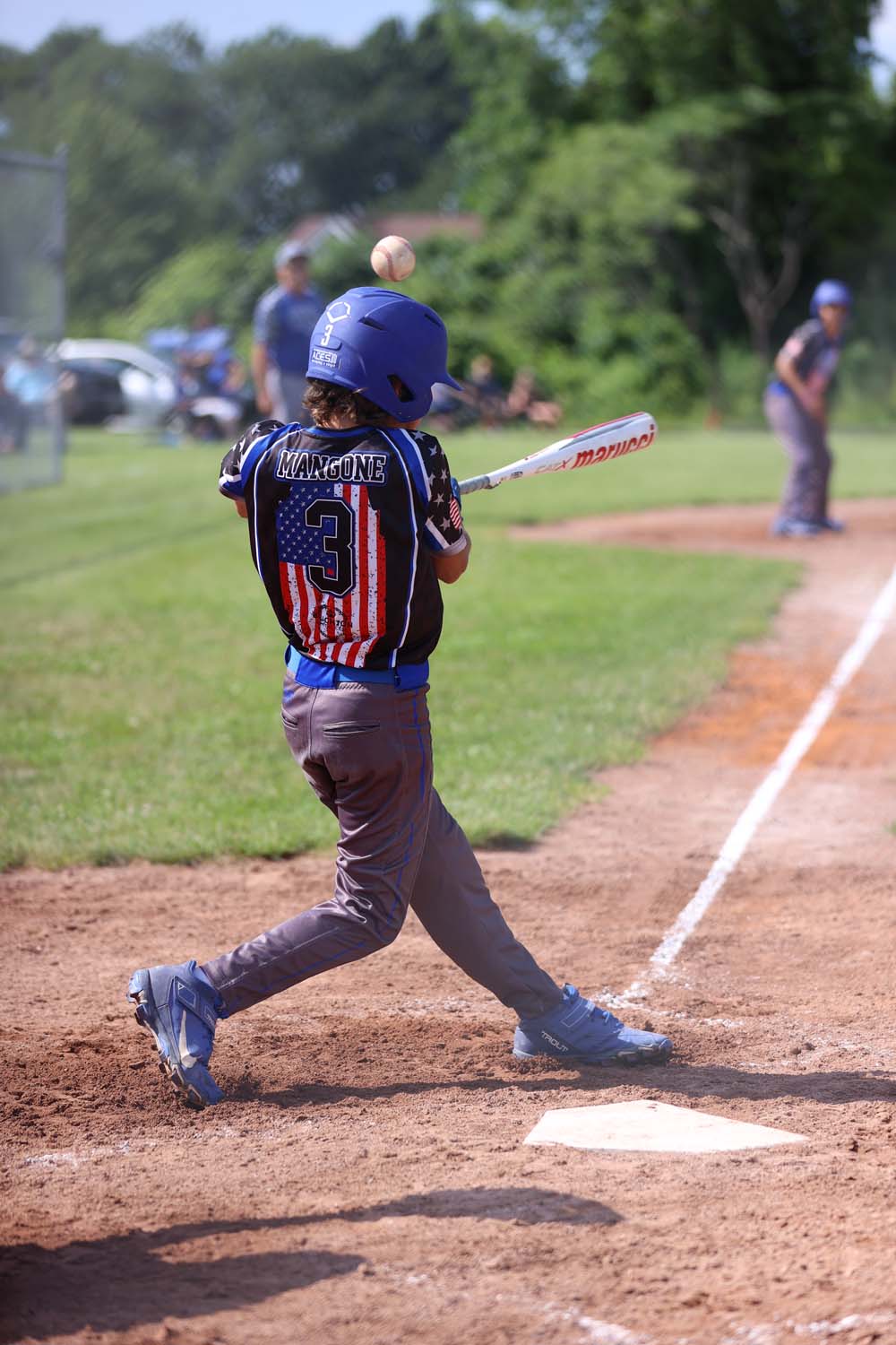 Evan fouling off a ball