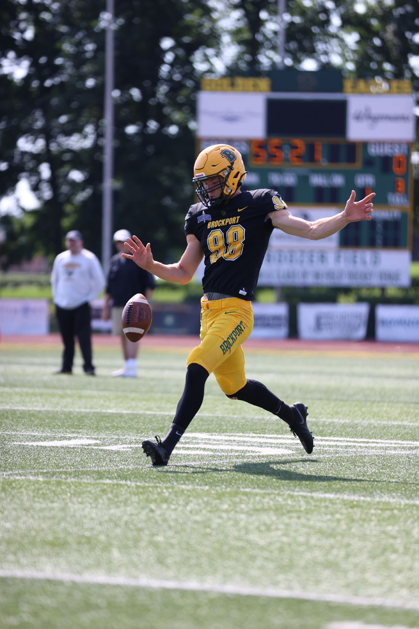 Brockport vs Framingham State- Punter Dan Giangrasso getting some work in before the game