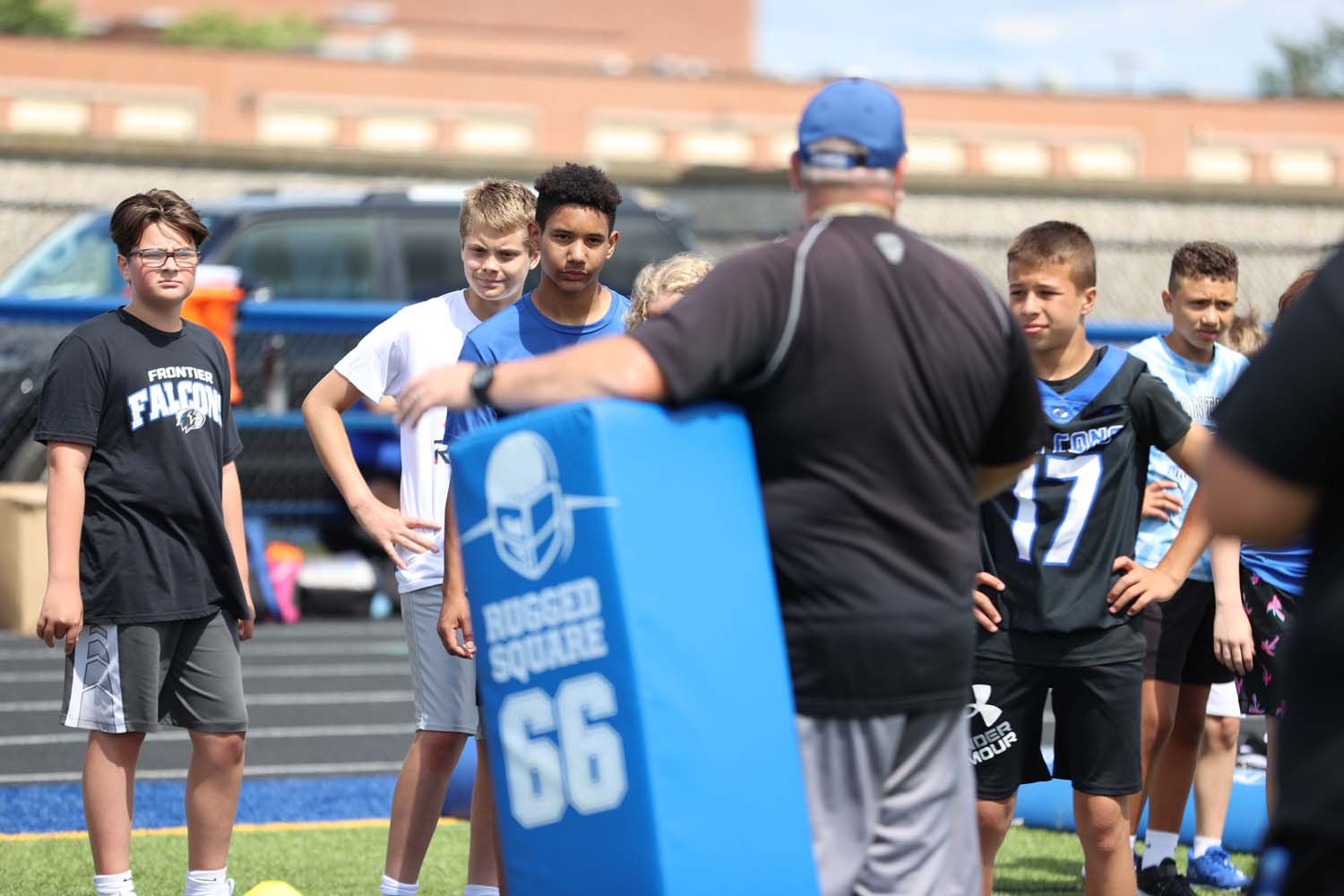 Campers listening to coach