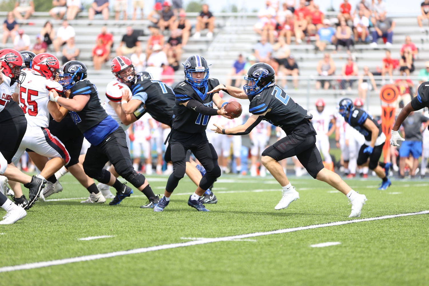 Frontier QB handing off the ball