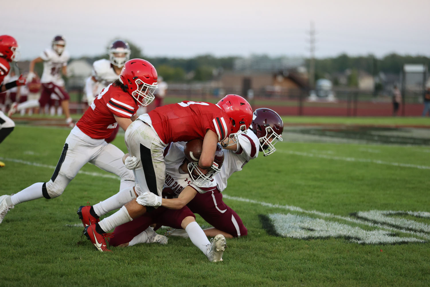 Lancaster Running back being tackled by OP defender