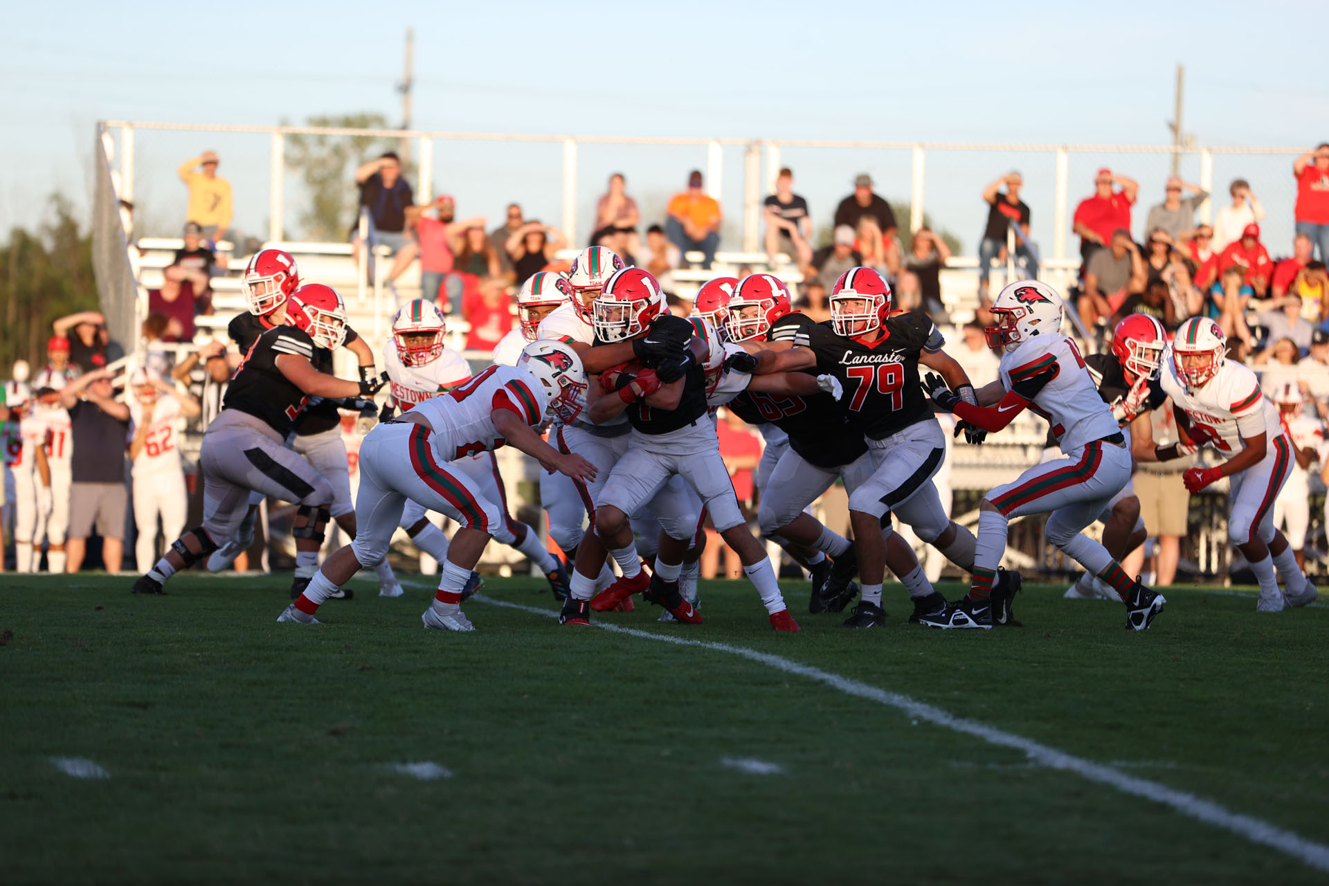 Lancaster running back getting tackled