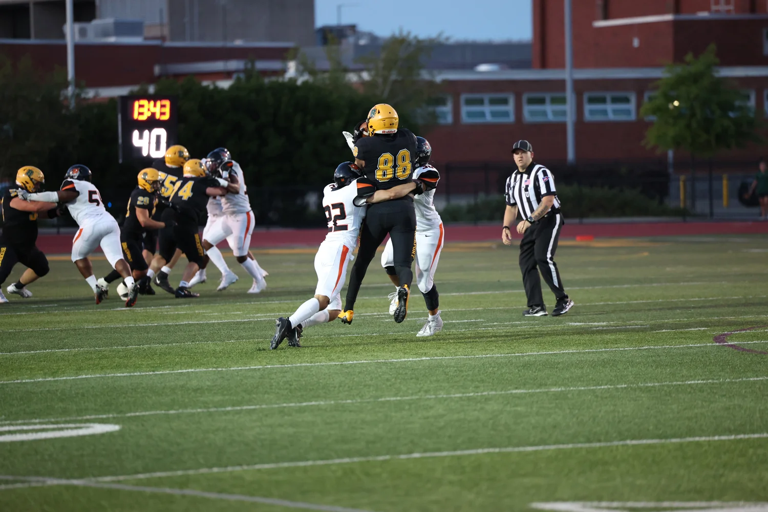TE with a contested catch over the middle