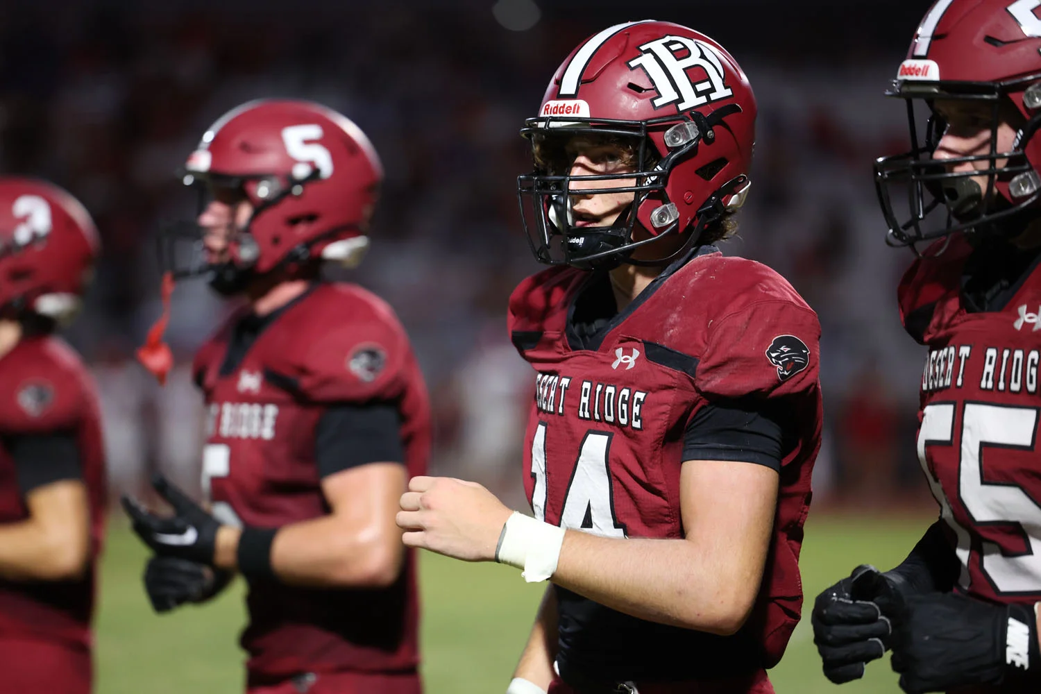 Desert Ridge players coming off the field