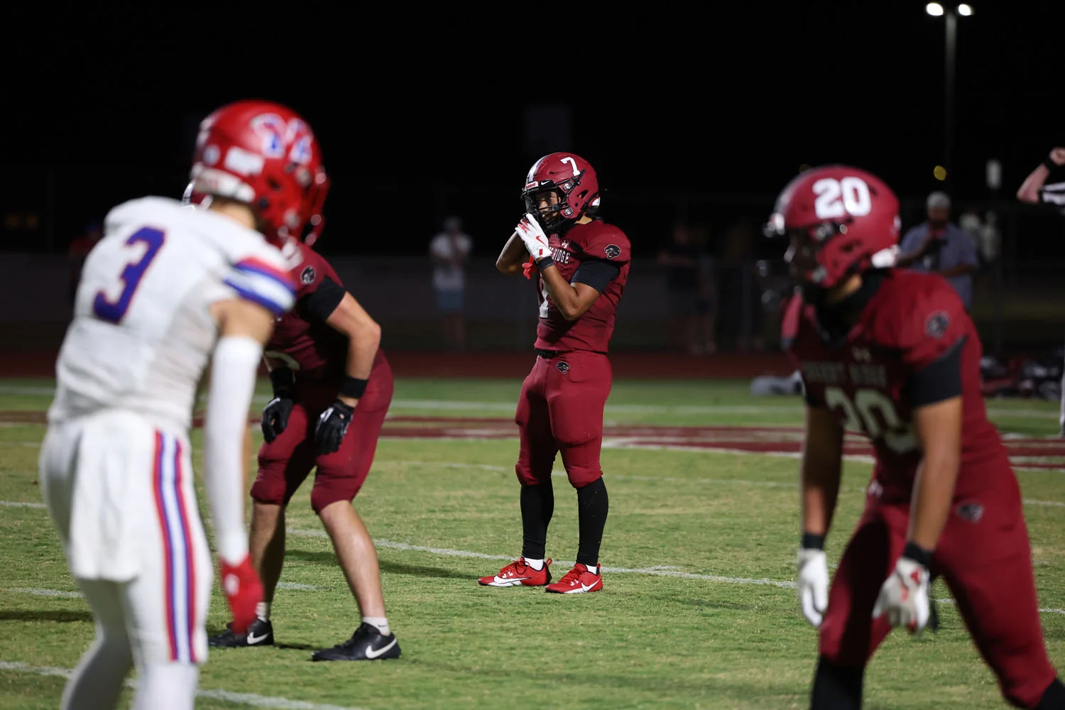 Strapping up the helmet before the play