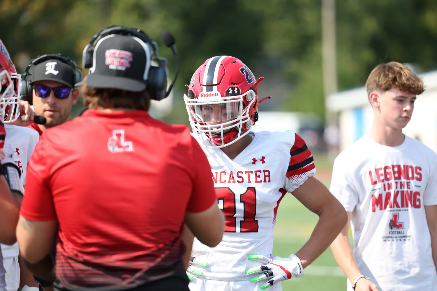 Lancaster player listening to coach in the huddle