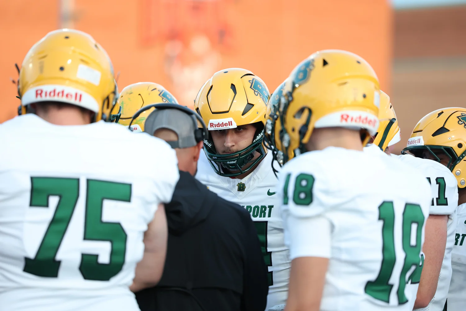 QB focused in the huddle