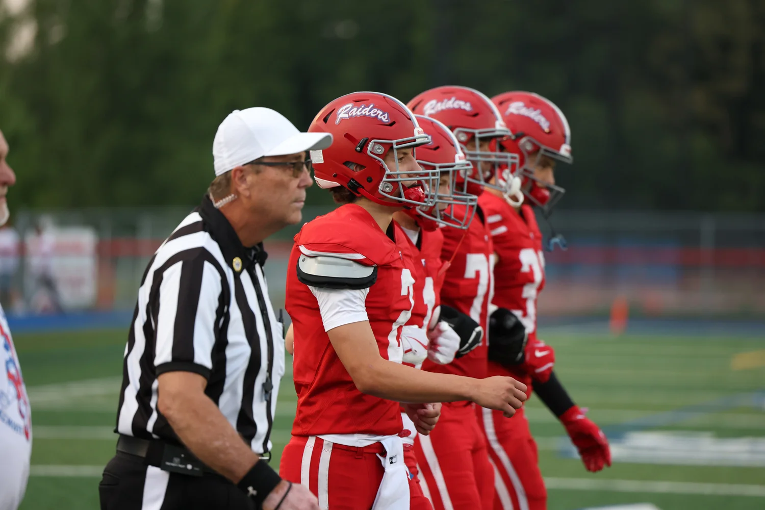 Captains headed to the coin toss