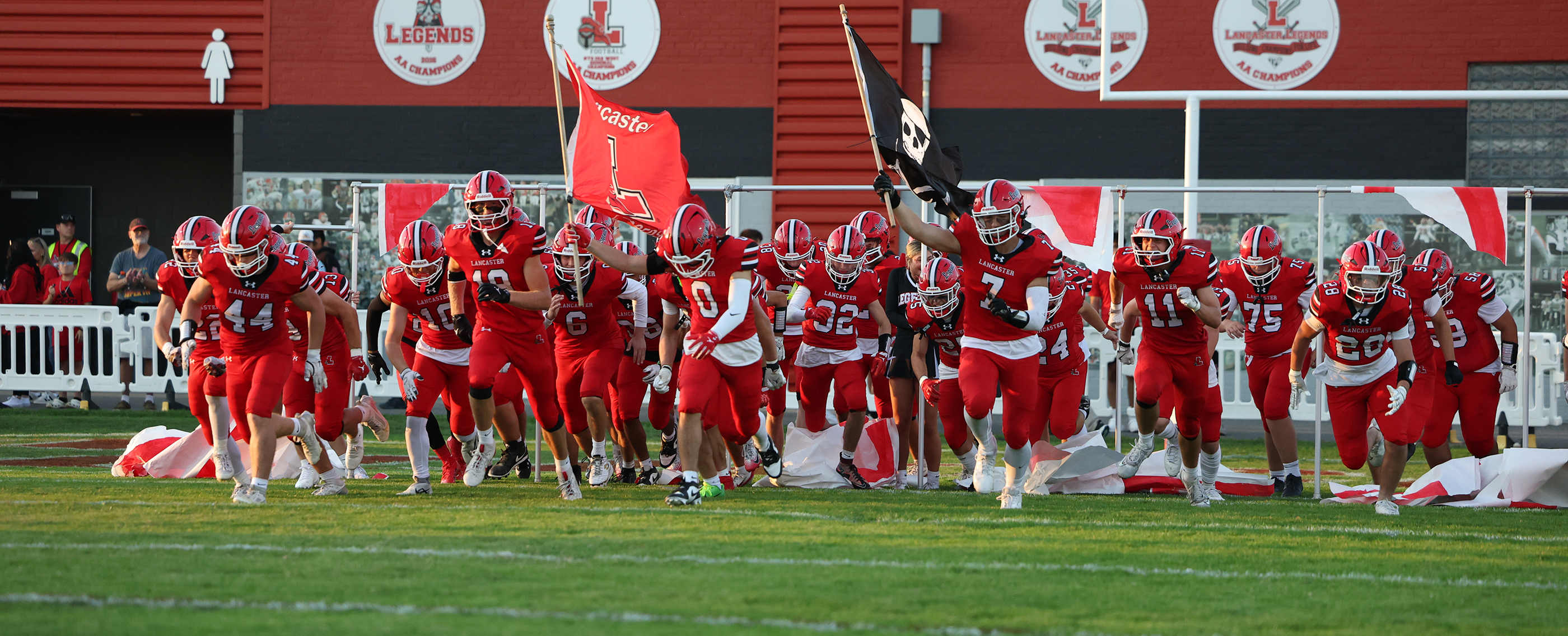 Lancaster running onto the field