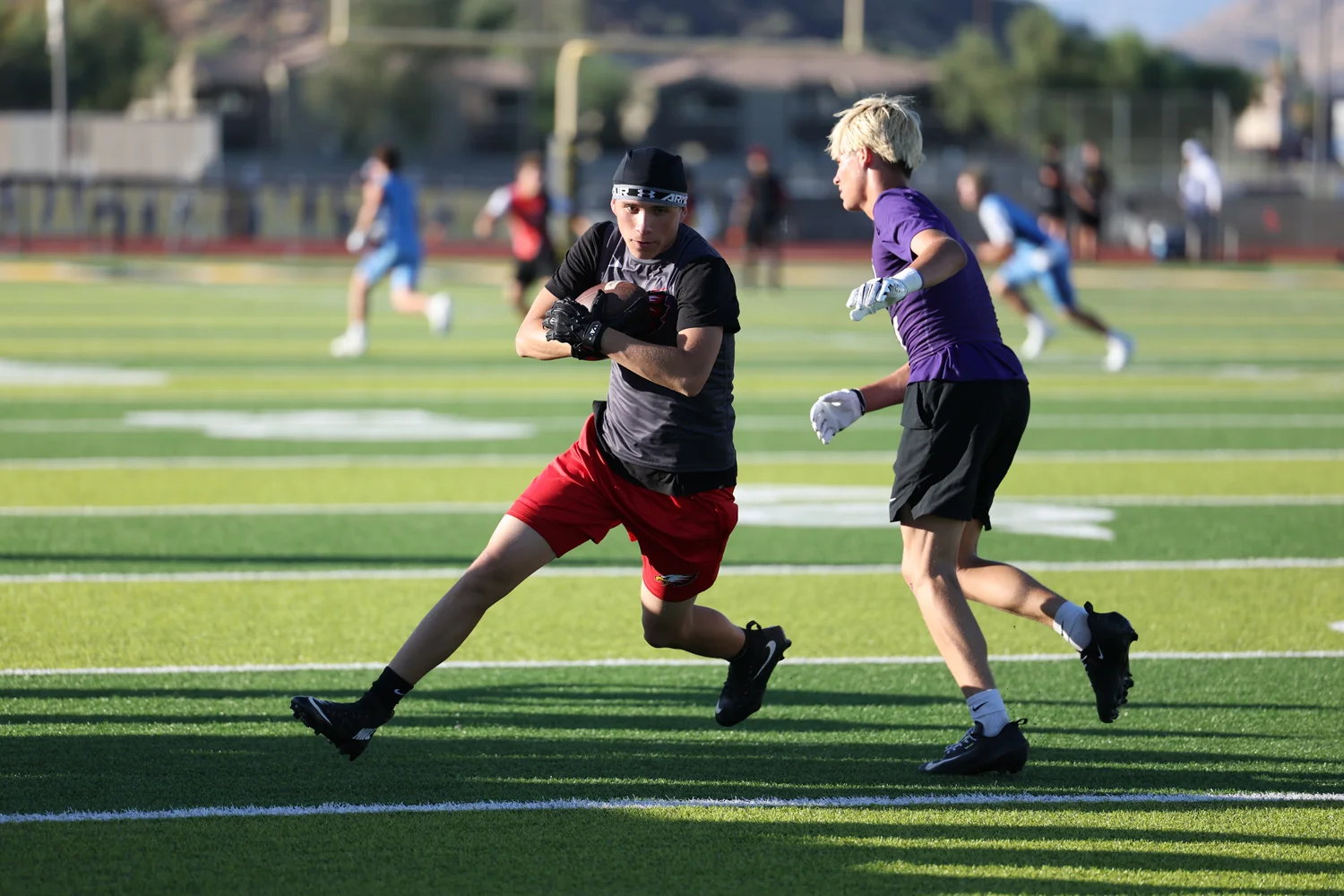 WR protecting the ball