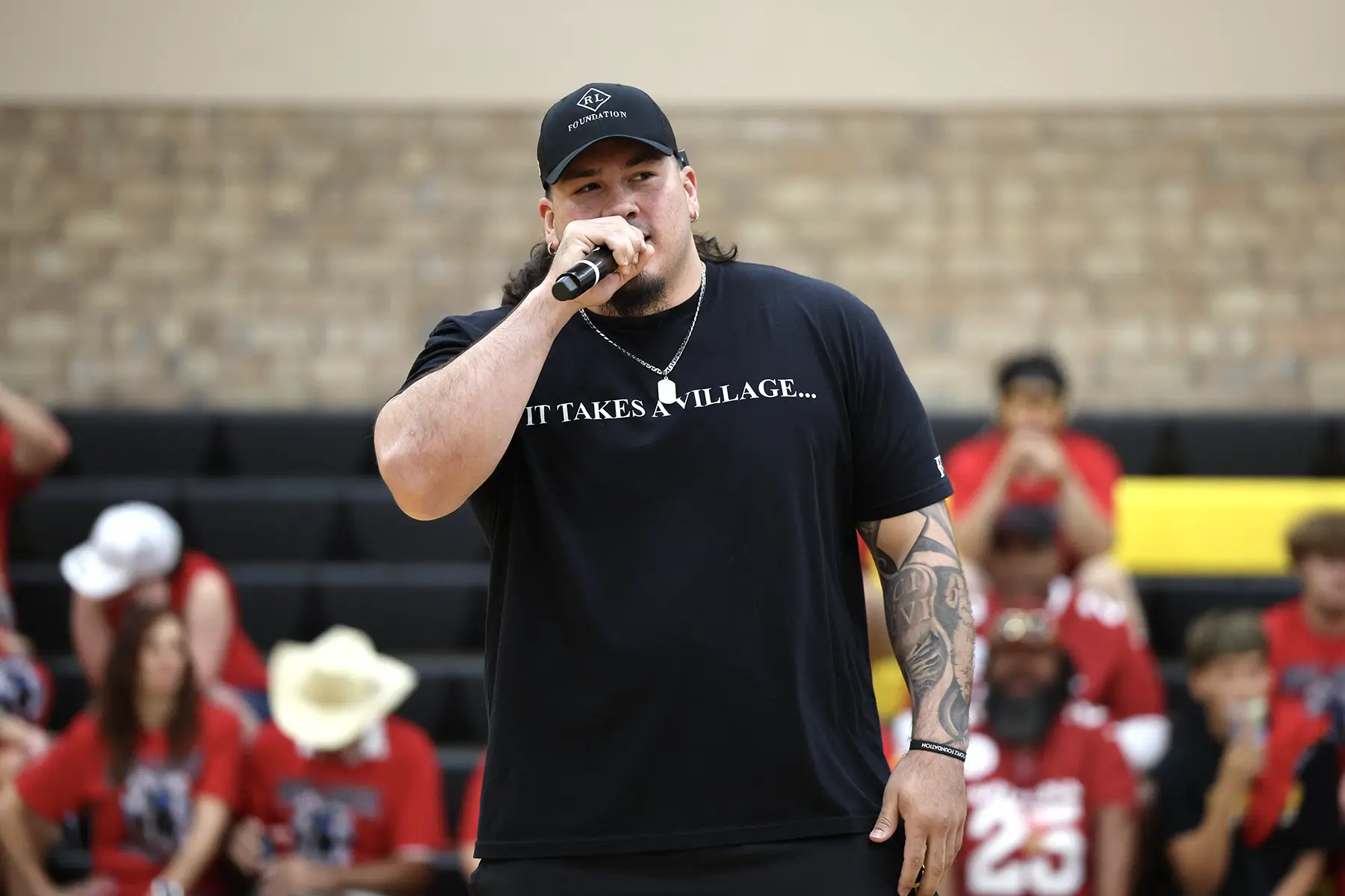 Roy Lopez speaking at his camp before hitting the field